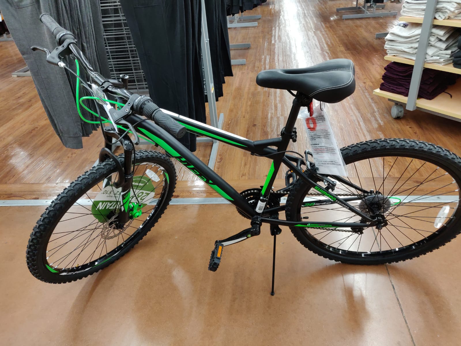 black and green huffy mountain bike